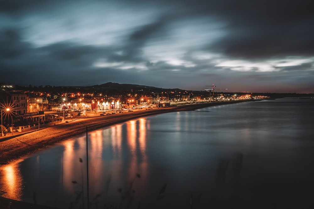 city lights turned on during night time