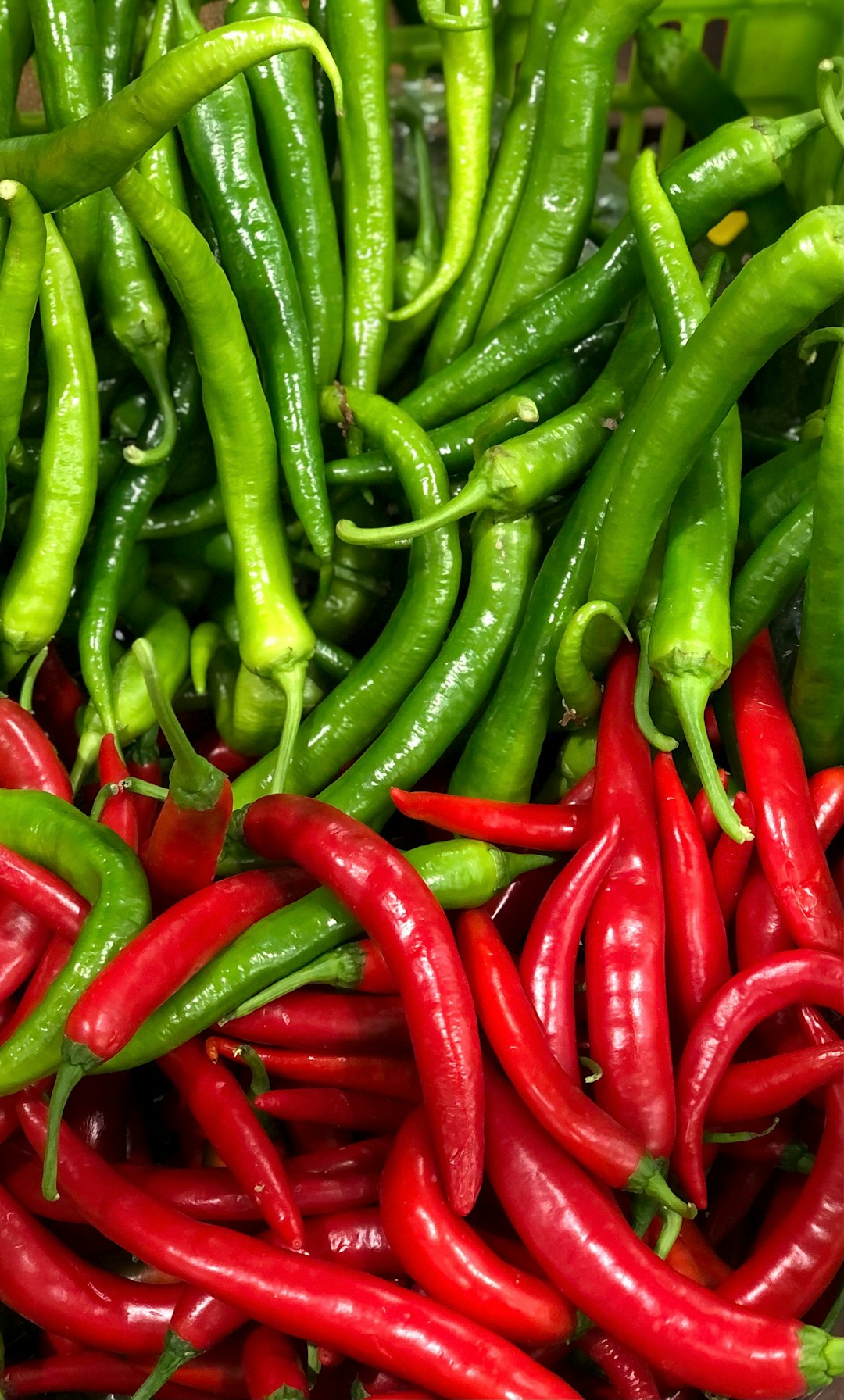 red chili lot in close up photography