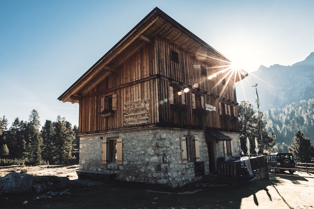 brown wooden house under blue sky during daytime