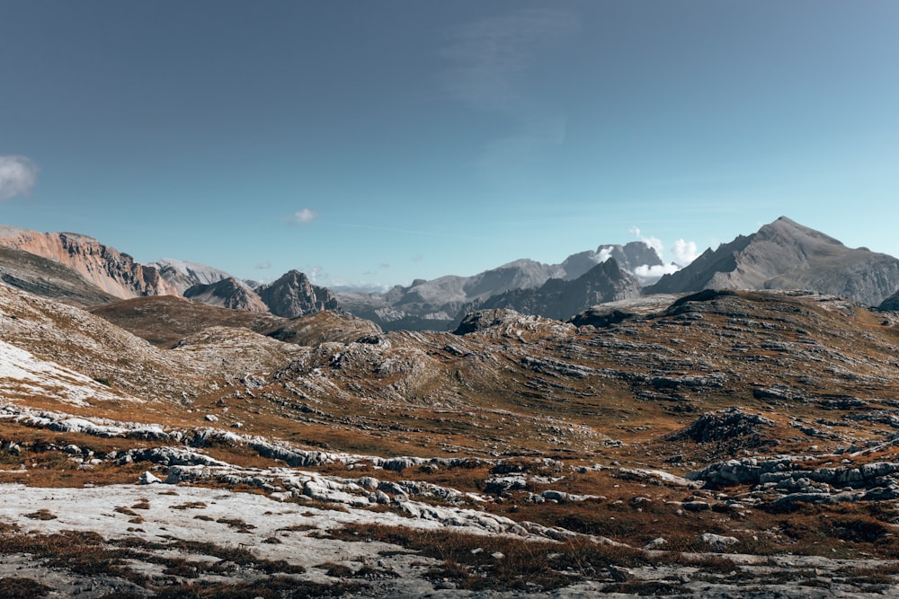 brown and white mountains under blue sky during daytime