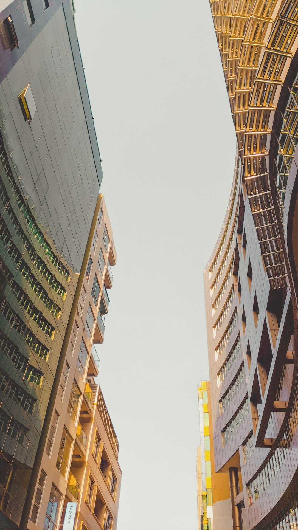 brown and white concrete building during daytime