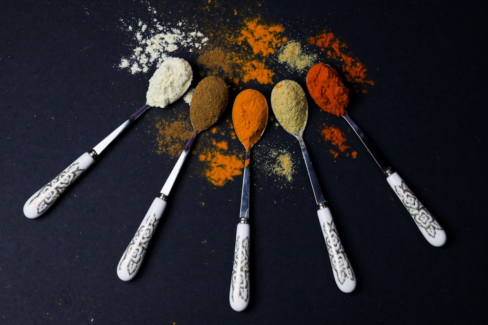 brown powder on black frying pan