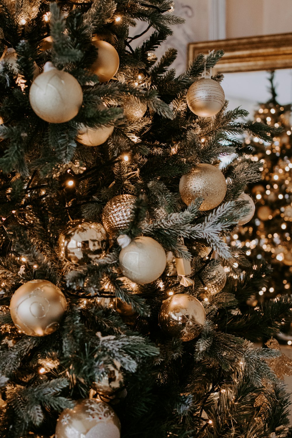 gold and silver baubles on christmas tree