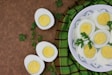 sliced lemon on white and green ceramic plate