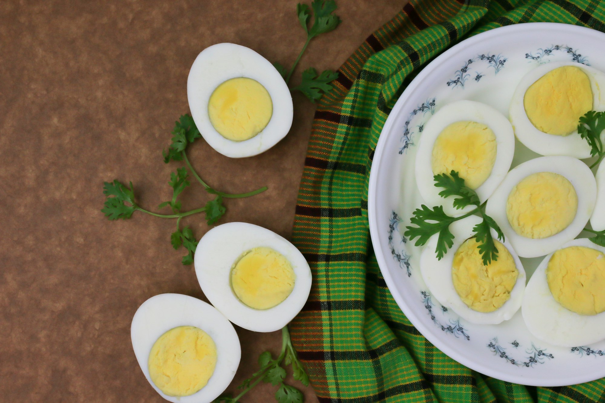 sliced lemon on white and green ceramic plate