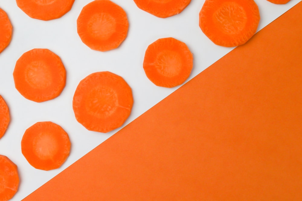 orange paper with round orange fruits
