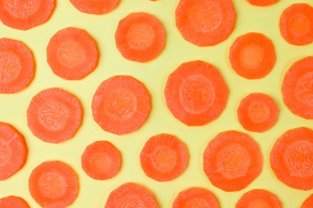 orange and yellow polka dot textile