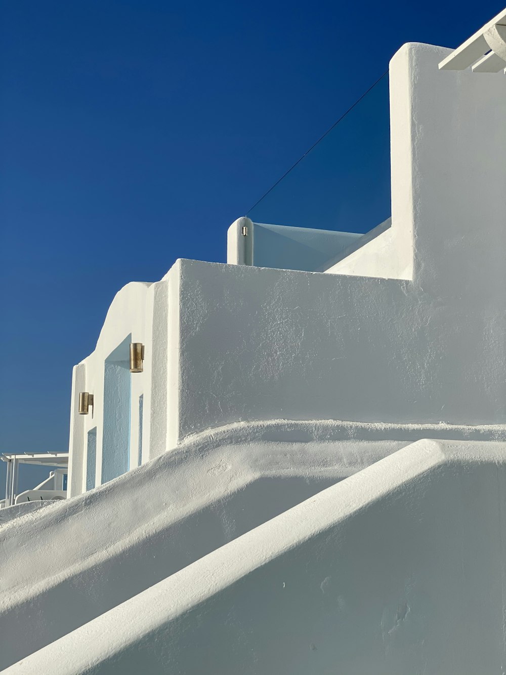 white concrete building under blue sky during daytime