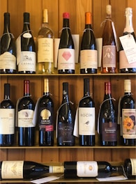 white labeled bottle on shelf