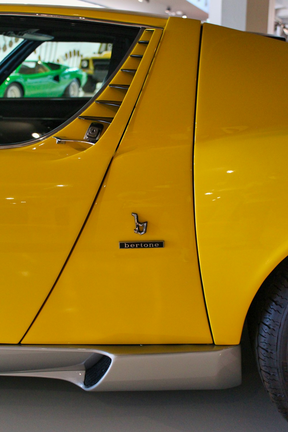 yellow car with black sticker