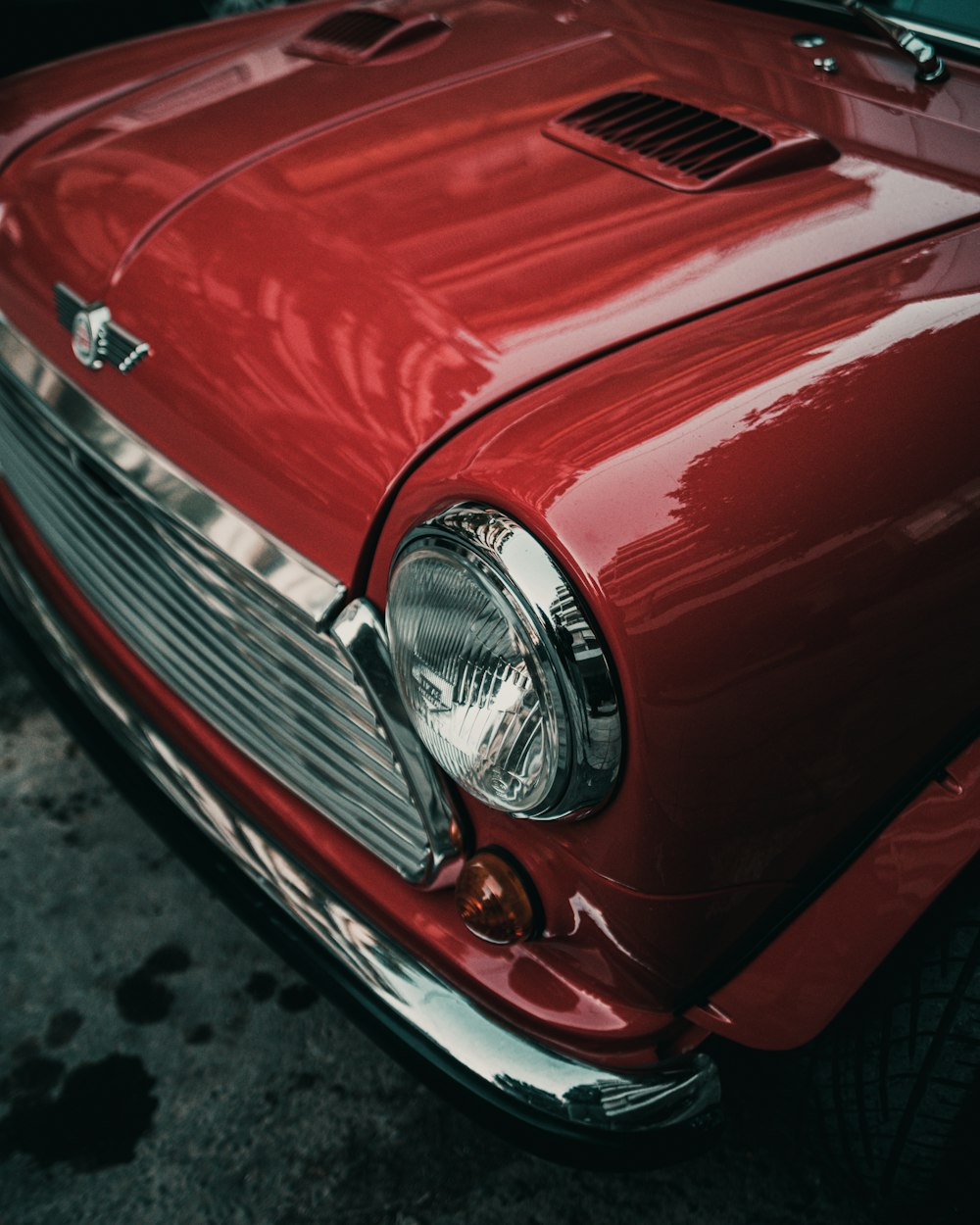 red car with silver headlight