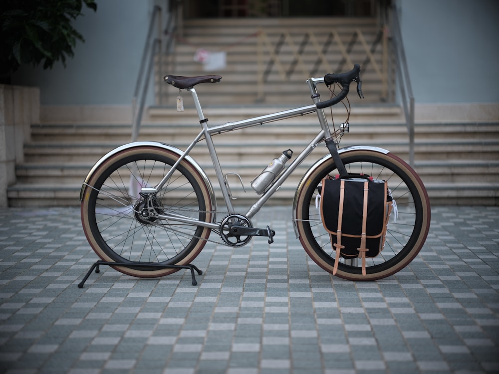 white city bike on brown brick floor