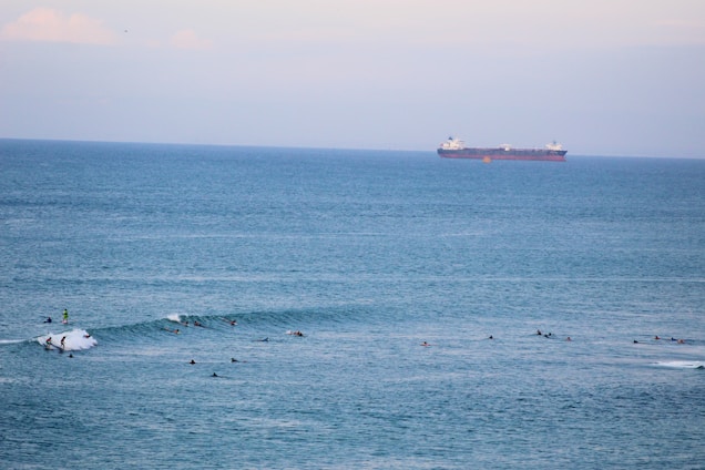 white ship on sea during daytime