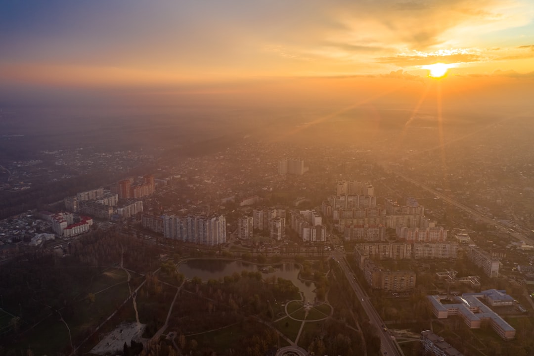 aerial view of city buildings during sunset
