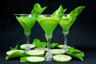 sliced lime on clear cocktail glass