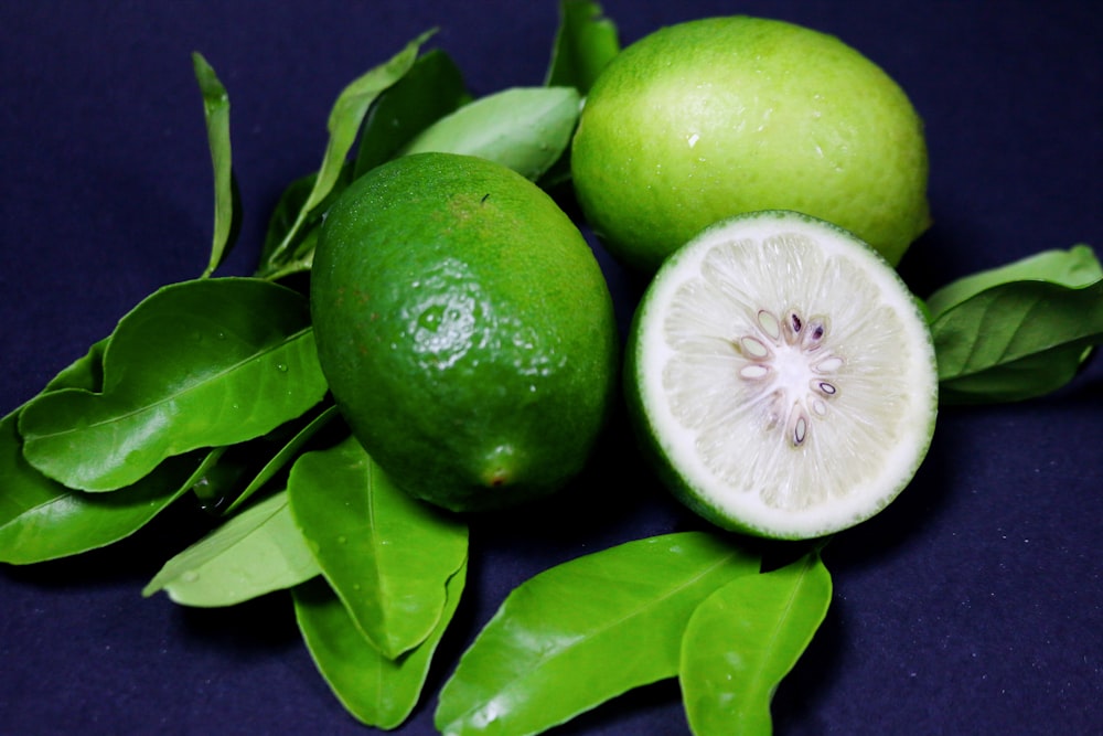 green citrus fruit on black surface