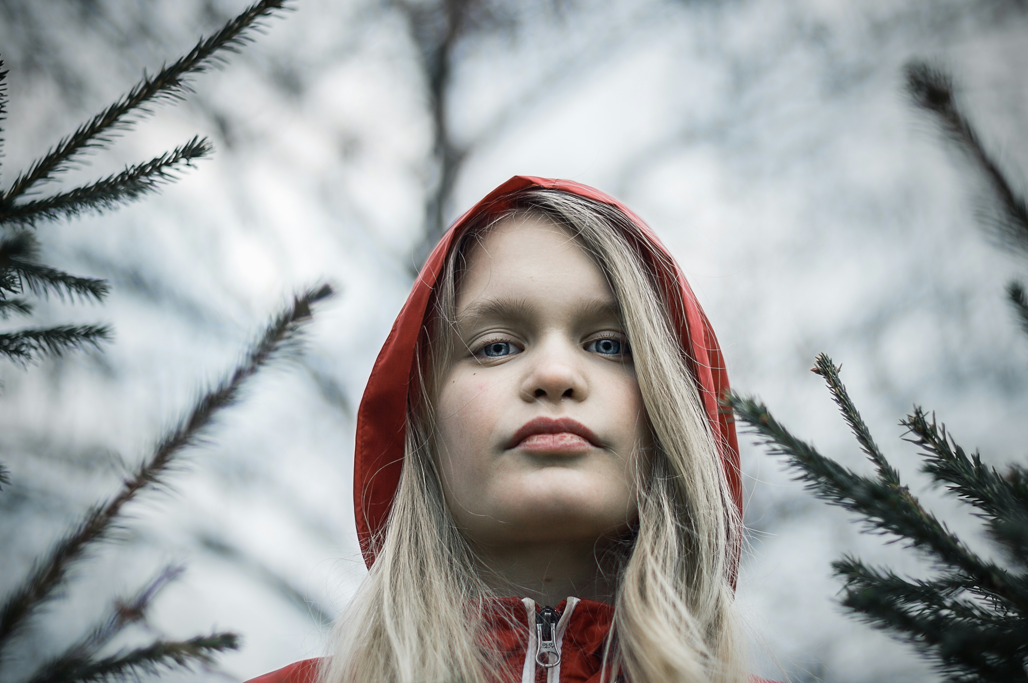 Portrait of the teenager in a red jacket