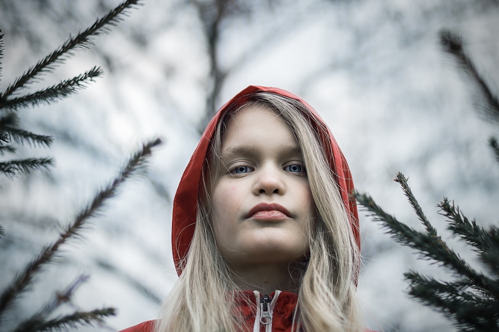 girl in red and white hoodie