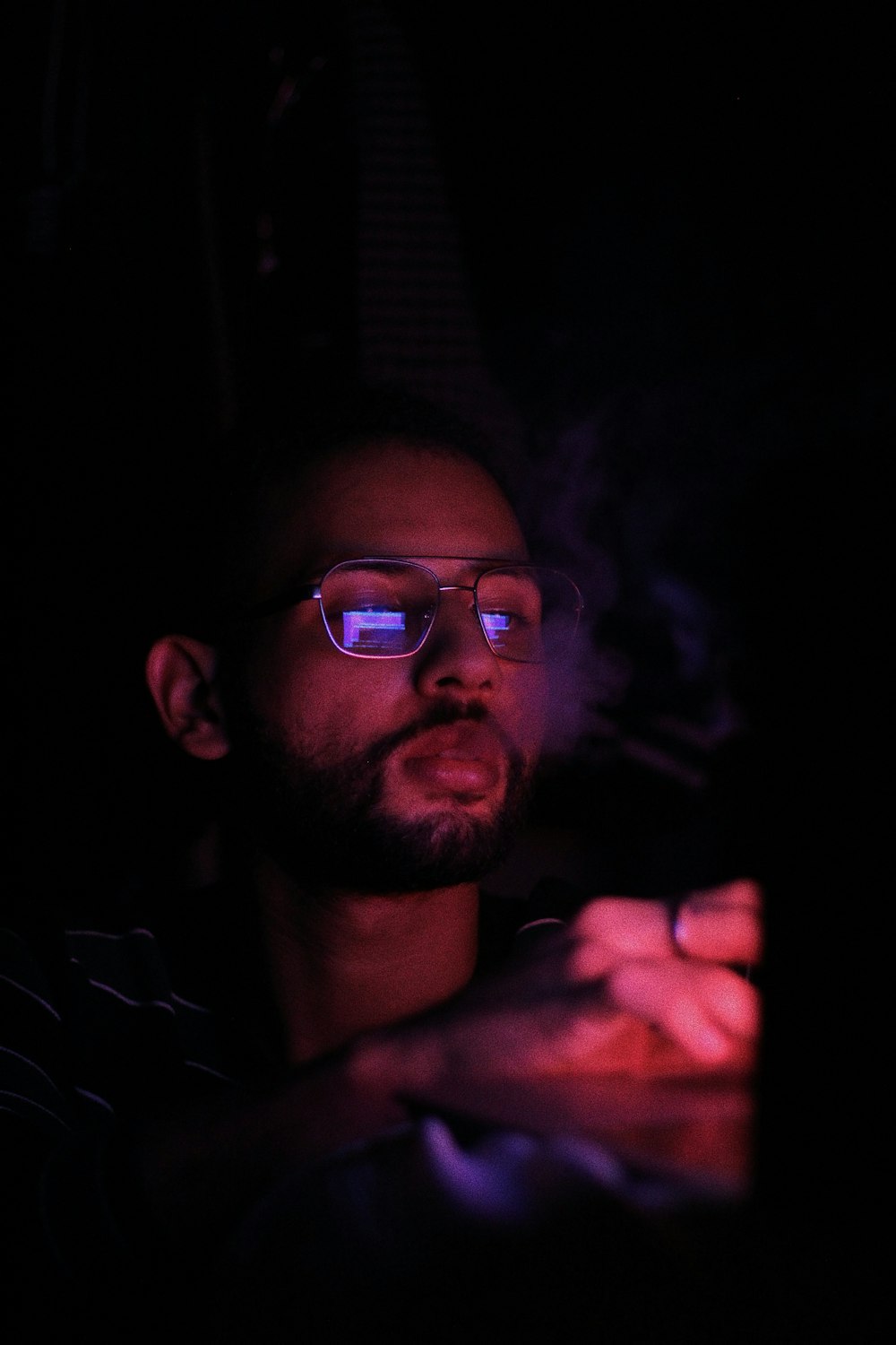 man in black framed eyeglasses