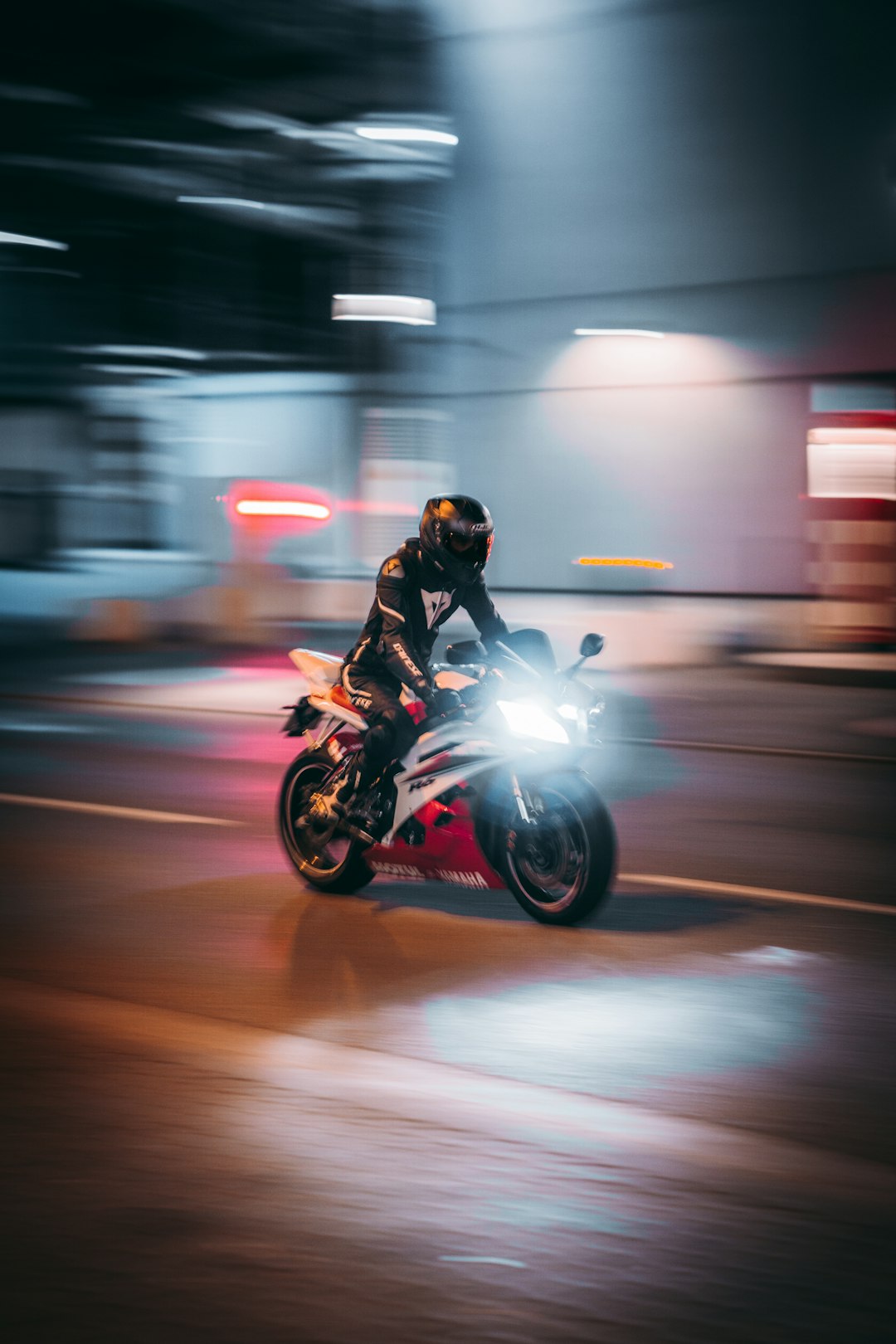 man in black jacket riding motorcycle