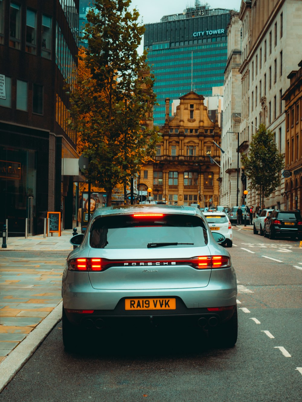 white car on road during daytime