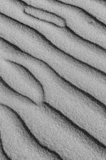 gray and black stripe textile