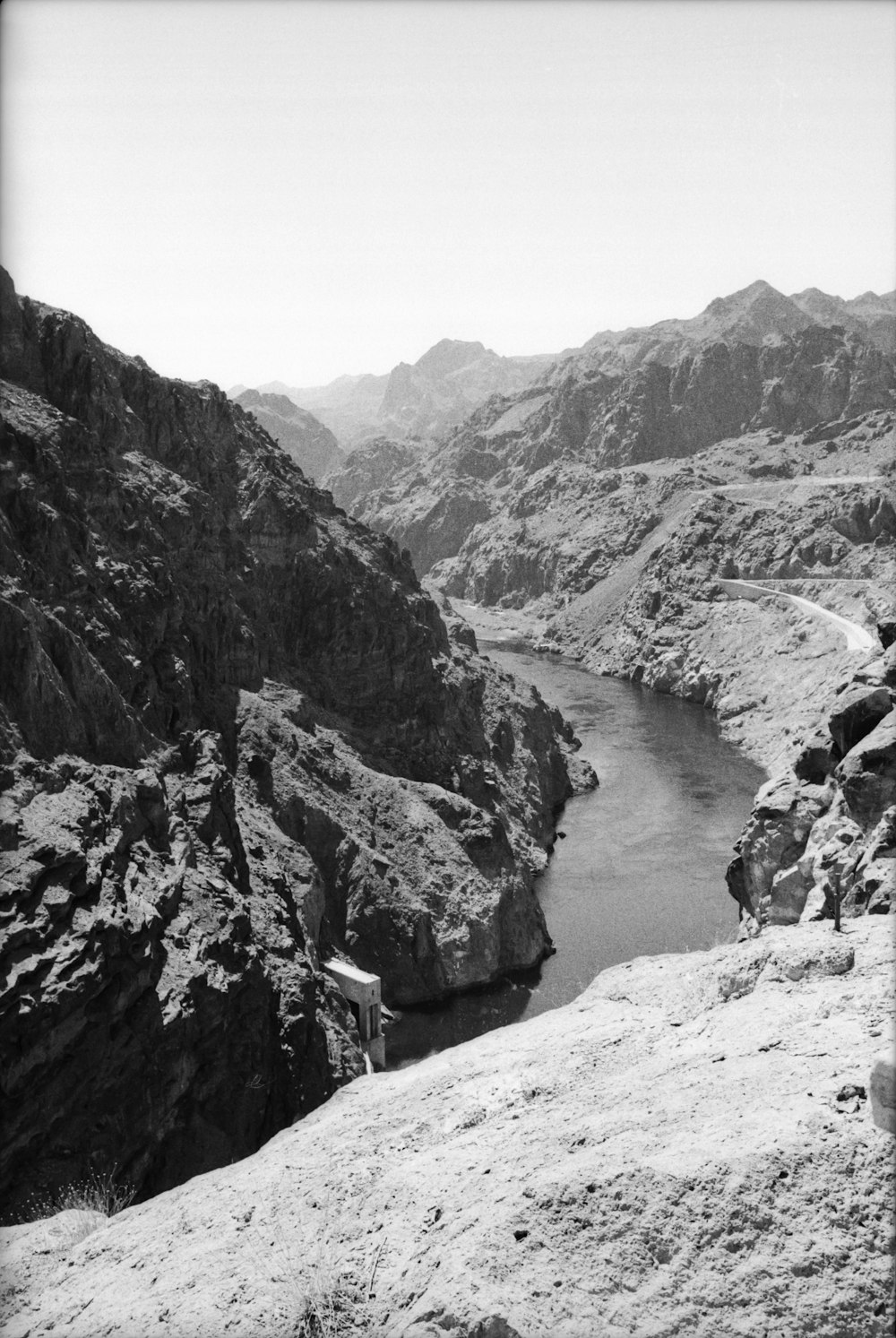 river between rocky mountains during daytime