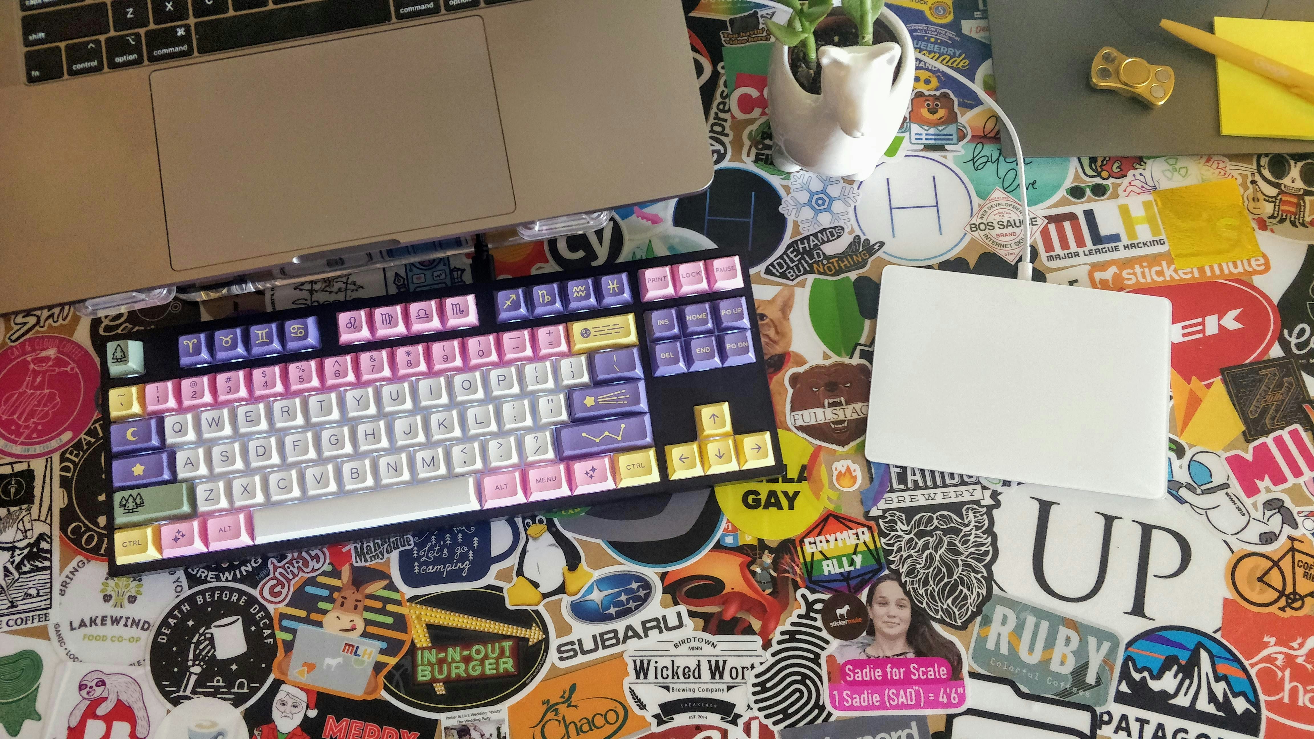 white and black computer keyboard, WFH desk productivity vibes.