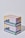 Two stacked pastel-colored boxes featuring an illustration of ocean waves. The boxes have text, including motivational phrases about mindfulness and productivity.