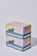Two stacked pastel-colored boxes featuring an illustration of ocean waves. The boxes have text, including motivational phrases about mindfulness and productivity.