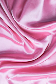 pink textile in close up photography