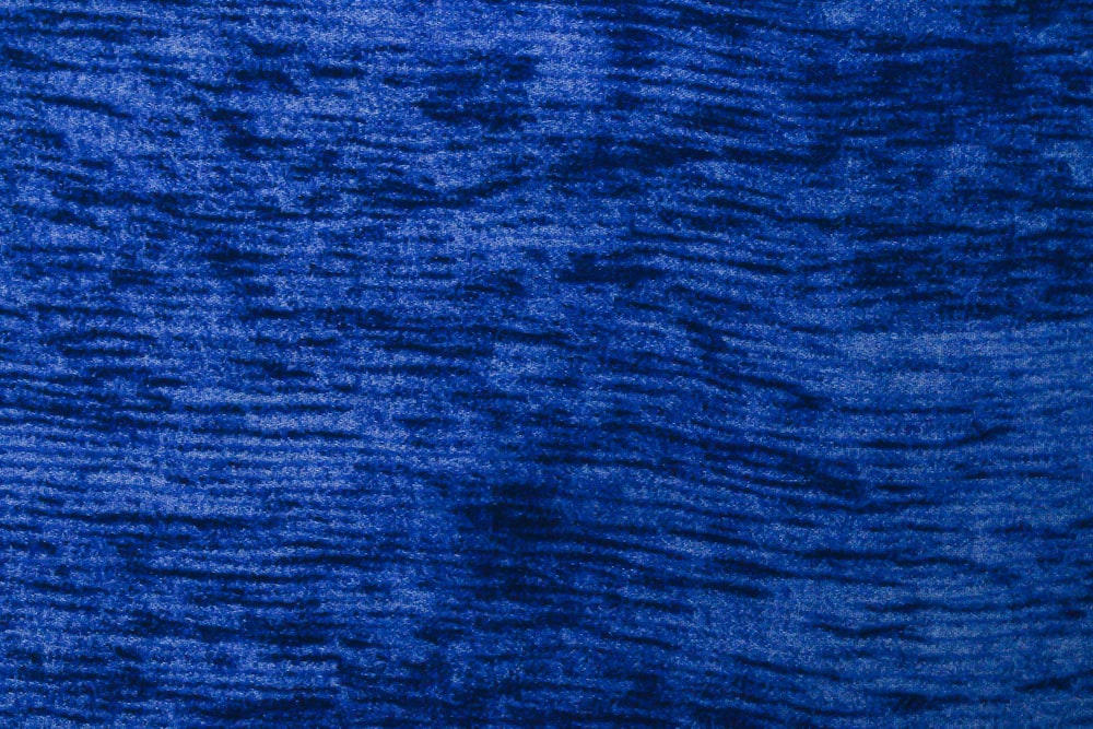 blue textile in close up photography