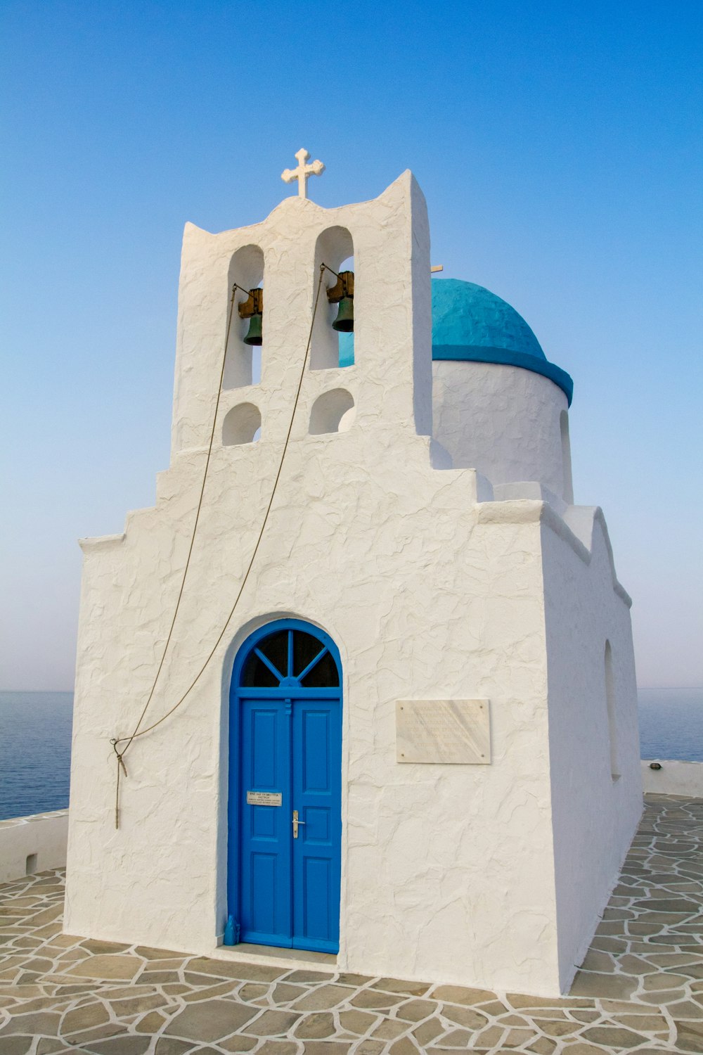 white and blue concrete church