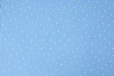 blue and white polka dot textile