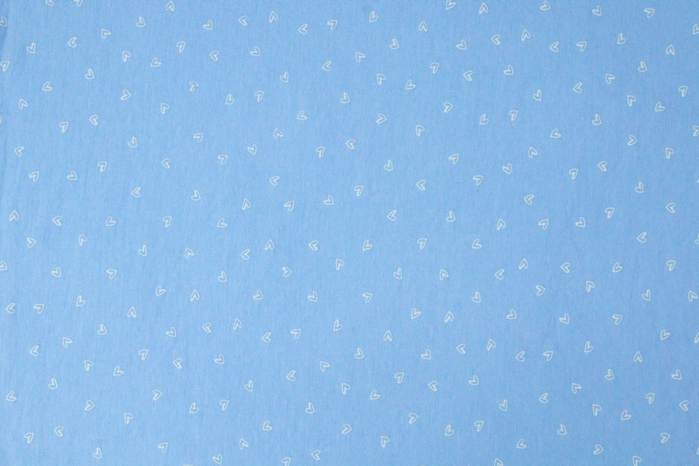 Textile à pois bleu et blanc