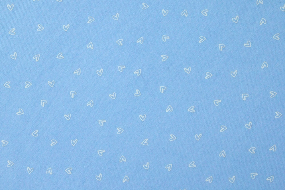 blue and white polka dot textile