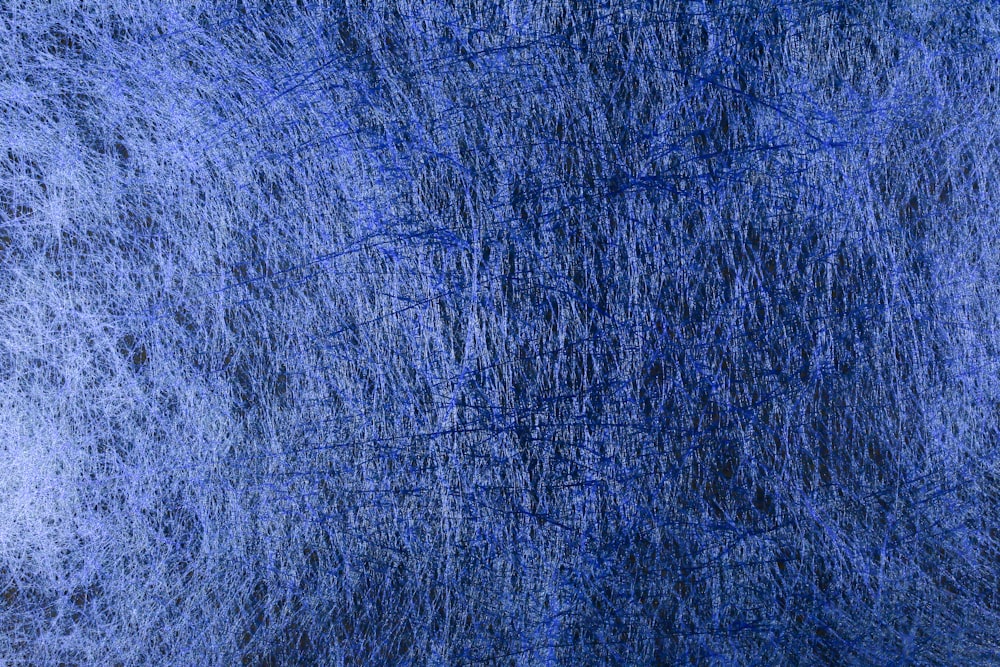 blue textile on brown wooden table