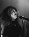woman singing on the stage