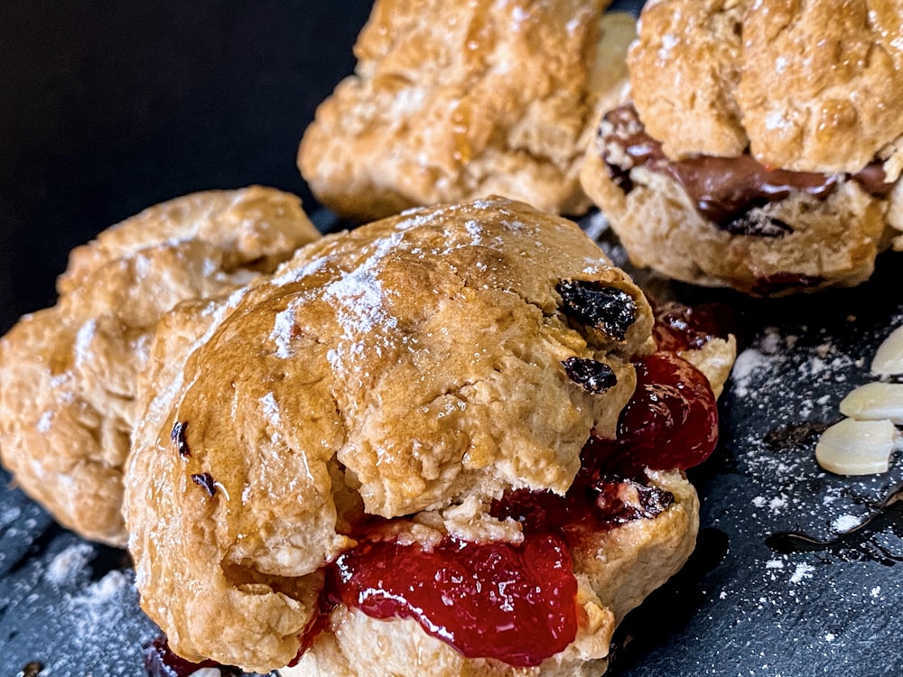 a close up of some pastries on a table