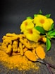 yellow flower on gray surface