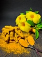 yellow flower on gray surface