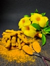 yellow flower on gray surface