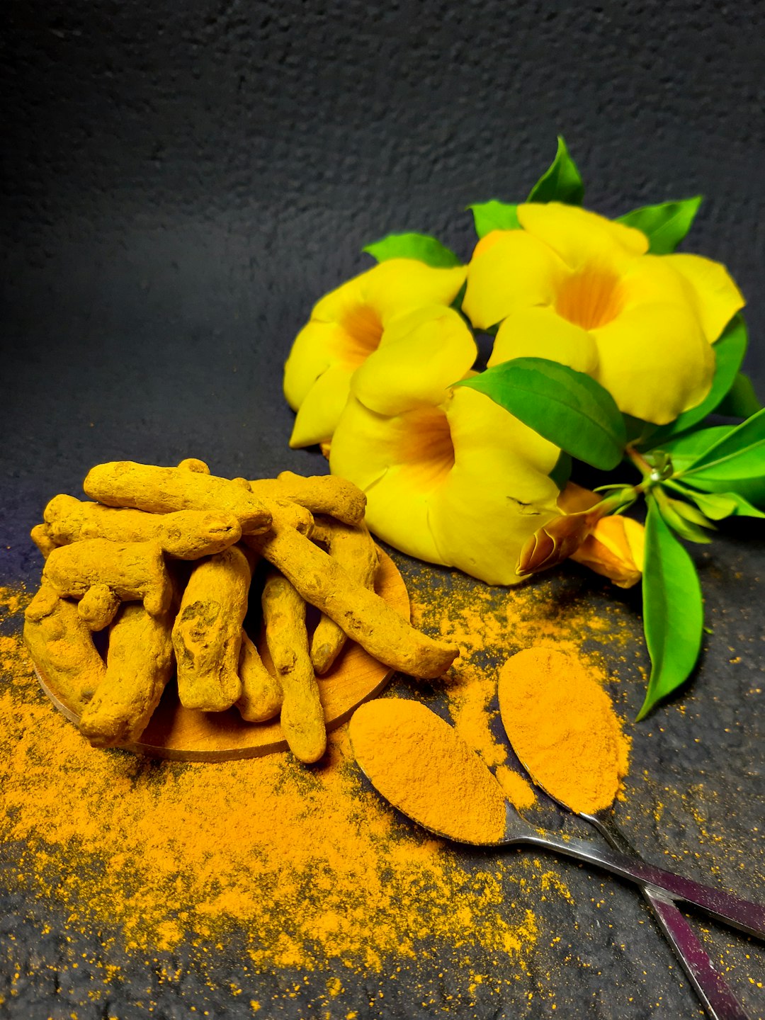 yellow flower on gray surface