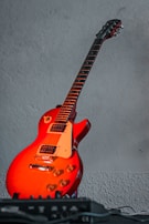 Visitors exploring interactive exhibits showcasing Les Paul's life and innovations.