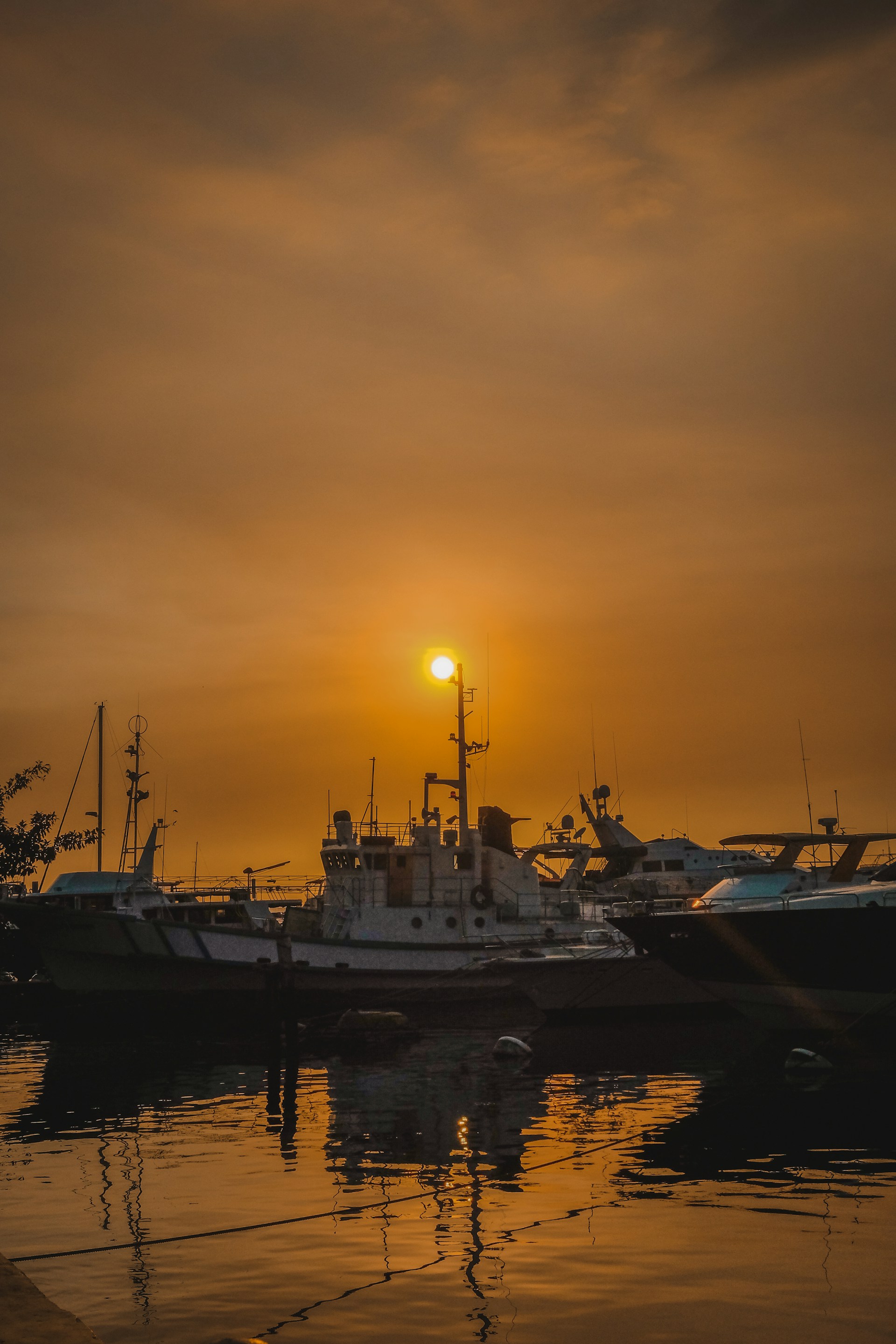 woman wearing yellow long-sleeved dress under white clouds and blue sky during daytime