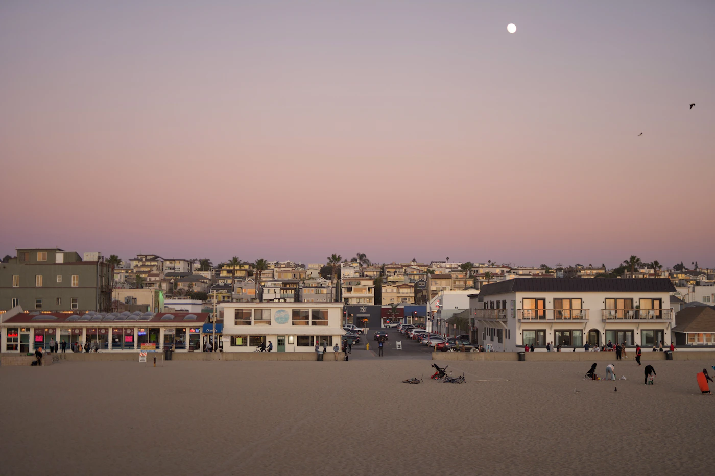 People walking near Hermosa Beach storefronts