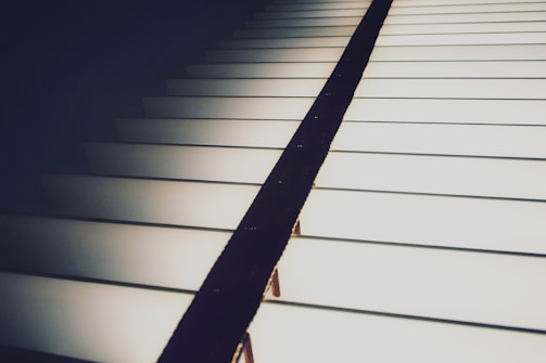 Zig-zag layout featuring a text block on the left and a video player on the right with cinematic lighting