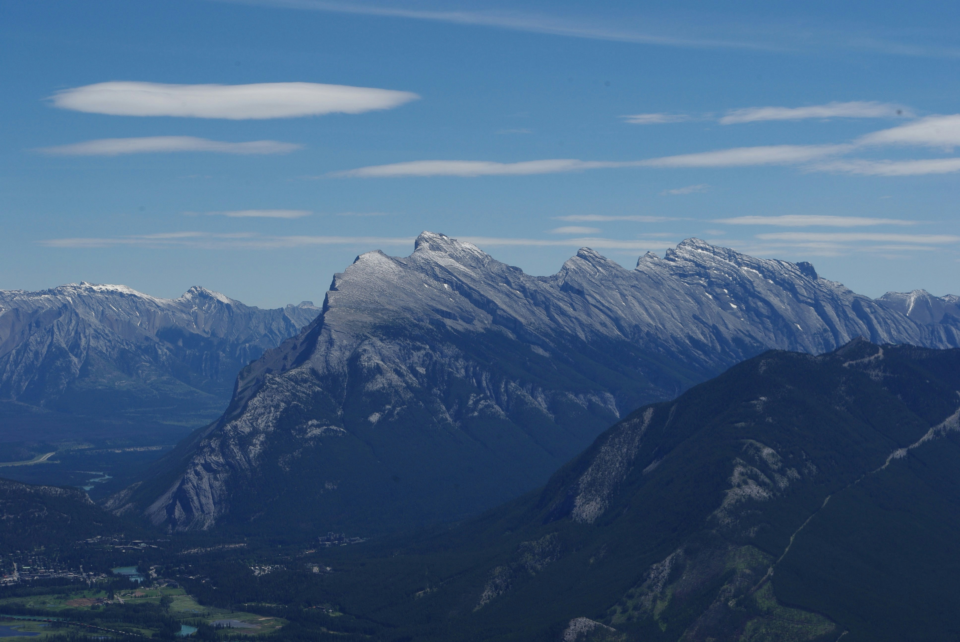 snow covered mountain under blue sky during daytime