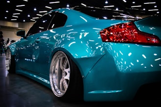 blue ferrari 458 italia on road
