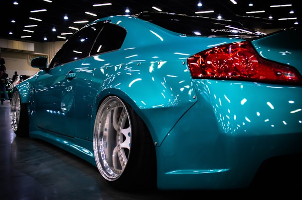 blue ferrari 458 italia on road